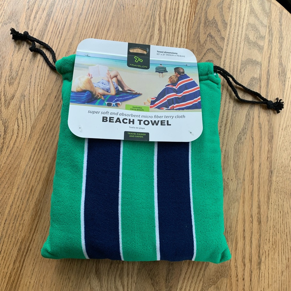 NEW beach towel in its own carry pouch